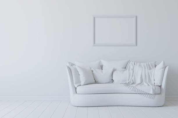 istock White room with sofa and picture frame on the wall. 3d rendering 1325406647