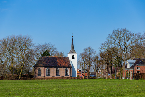 Landscape with white protestant church in Roderwolde in municipality Noordenveld in Groningen The Netherlands