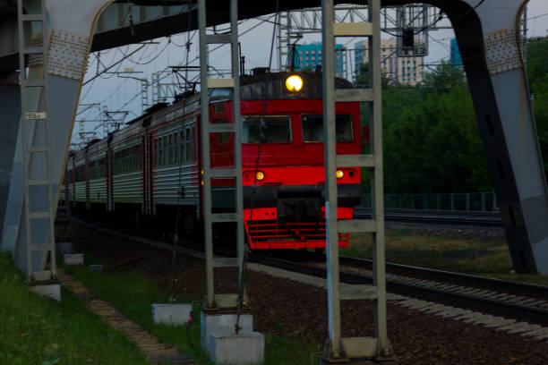 istock The electric train left a beautiful trail of headlights behind it 1325410576