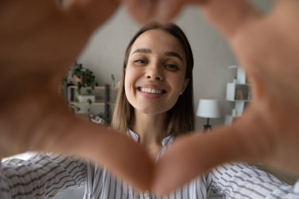 istock Happy sincere millennial female client giving positive feedback. 1325412576