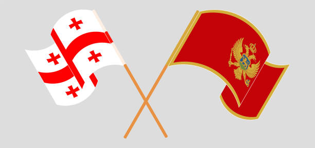 Crossed and waving flags of Georgia and Montenegro Crossed and waving flags of Georgia and Montenegro. Vector illustration georgia football stock illustrations