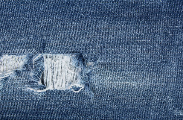 istock Blue jean texture background, pattern of denim in old and tear. 1325414977