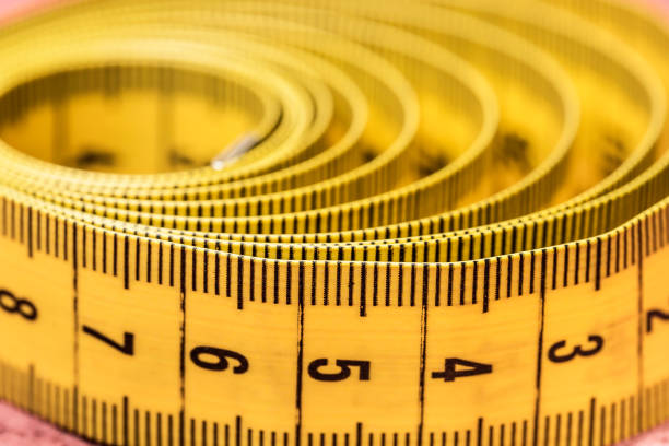 istock Measuring tape of the tailor 1325415584
