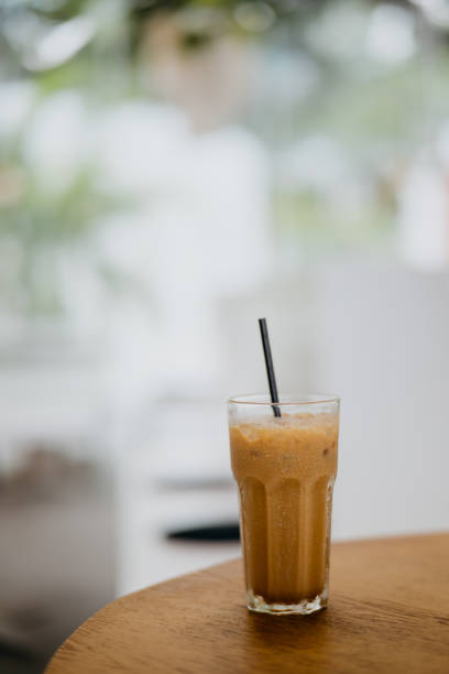istock Iced latte on top of a wooden table 1325415799