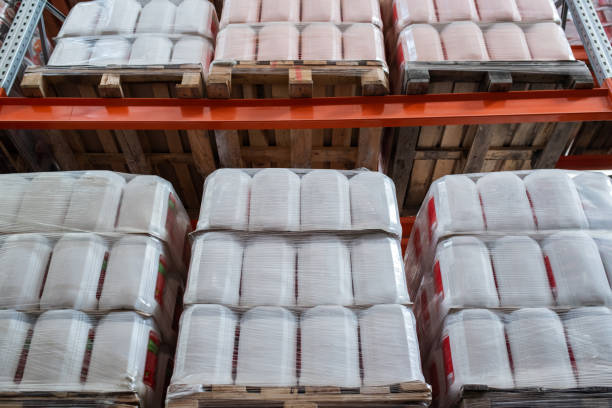 istock Rows of packed plastic cisterns with liquid goods 1325416940