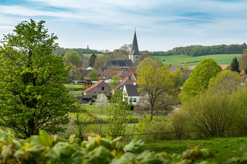 View of the village of Noorbeek in the Geul valley, South Limburg, Netherlands. Like many villages in the south of Limburg, Noorbeek is beautifully situated in the hilly landscape that makes this region so unique. To be precise, Noorbeek lies on the Plateau of Margraten, at a height of approximately 150 metres above sea level (which is quiExcellent example of a Limburg hilltop village.te high for Dutch standards).