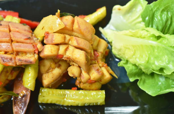 istock spicy fried squid with chili and lemon leaf couple lettuce 1325420833