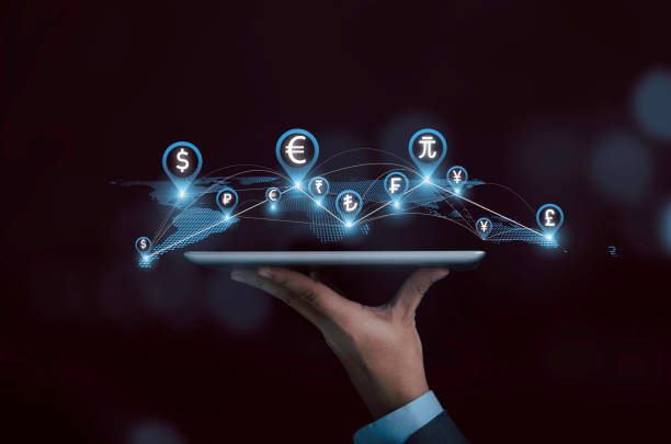 istock Businessman hand holding tablet with virtual world map connection line and global currency , Technology transfer money and Currency exchange concept. 1325421229