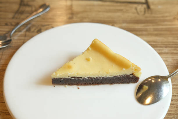 istock slice of cheese cake on plate on table 1325422385