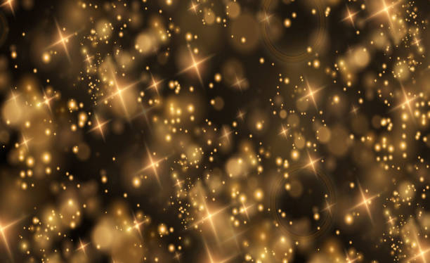 istock Christmas glowing light bokeh confetti and spark overlay texture for your design 1325422460