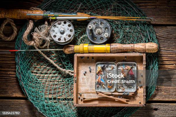 Vintage Fishing Tackle With Net Rods And Fishing Flies Stock Photo