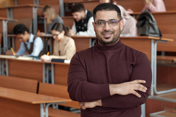 istock Successful teacher of university looking at you 1325422784