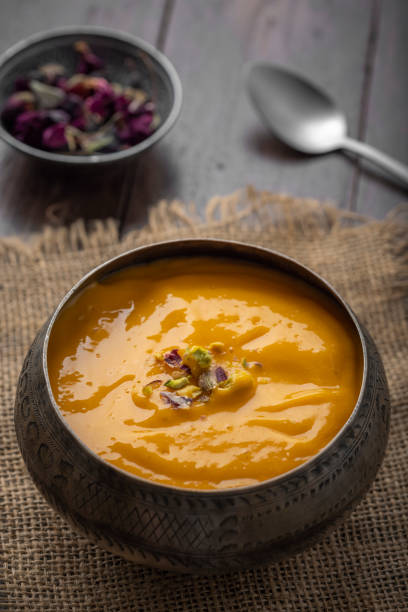 istock Mango Pulp / Aam rus or Ras served in small bowls 1325423690