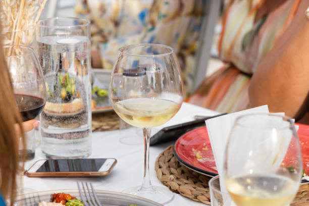 istock wine glass standing on the table at a celebration 1325426665