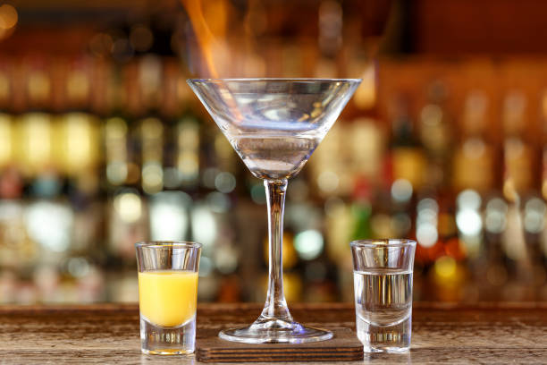 istock A tropical cocktail with fire stands on the bar. 1325430540