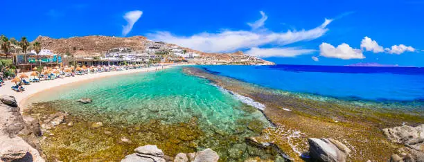 Photo of Greece summer holidays. Cyclades .Most famous and beautiful beaches of Mykonos island - Paradise beach famous for beach parties ,with crystal celar waters