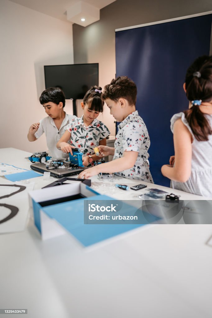 School Learners Coding Computer Programs Students In Computer Coding Class Building And Programing Robot Vehicle ...