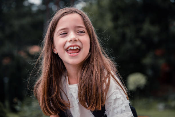 istock Happy girl smiling 1325433526