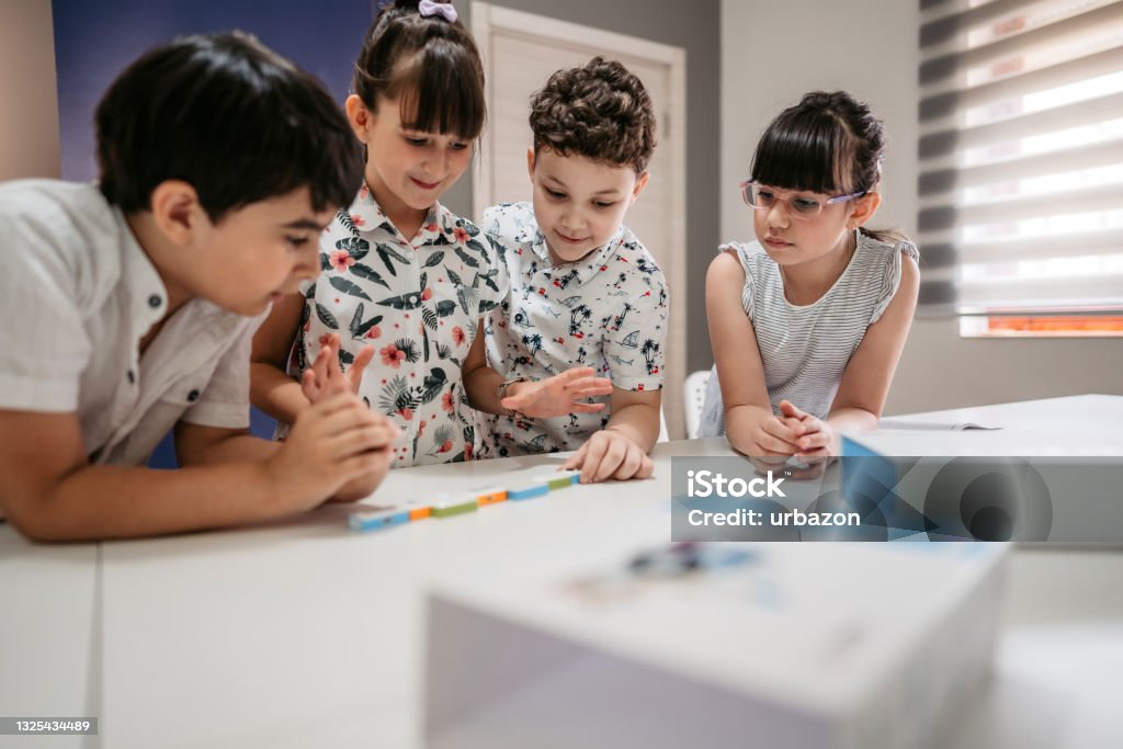 Elementary School Children Learning Programing Basics With Coding ...