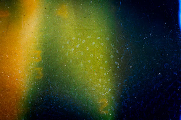 istock Abstract colorful scratched film background 1325434623