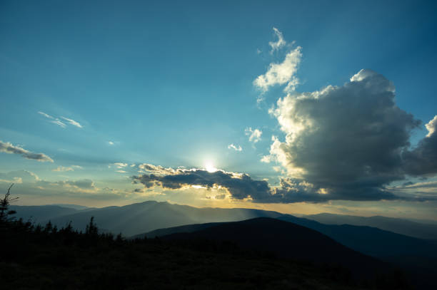 istock Sun rays and beautiful sky at sunset in the Carpathian mountains 1325440845