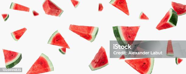 Beautiful Banner With Many Flying Watermelon Slices Closeup On A White Background Stock Photo - Download Image Now