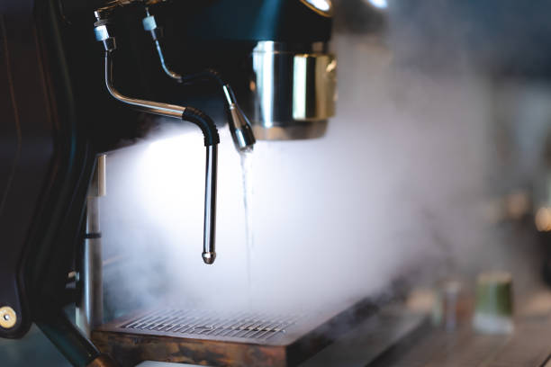 istock professional espresso coffee machine for making caffeine hot drink, fresh beverage prepare bar maker in cafeteria breakfast,  brown and black, for barista pouring a cup in shop cafe shop 1325447702