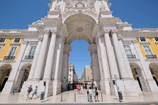 LISBON-PORTUGAL june 15, 2019: View of the arch and the statue at The Praca do Comercio or Commerce Square and located in the city of Lisbon, Portugal.