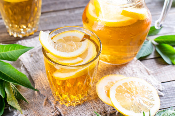 istock Cool freshly made lemonade and fruits on table 1325467217