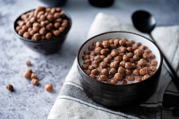 istock Fresh breakfast with chocolate balls with milk in a bowl 1325473771