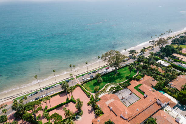 istock Aerial over houses along beach 1325473783