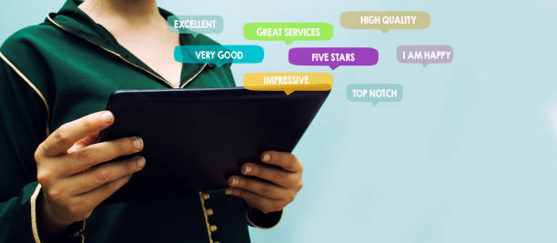 istock Customer Experience Concept. closeup women wearing morocco abaya and using Smartphone. Surrounded by Positive Review in Speech Bubble and Social Network icons 1325473926