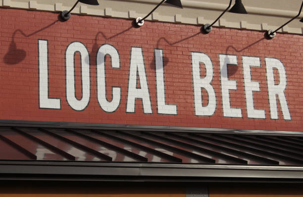 istock Local Beer Sign on Brick Wall Rural Cafe Sign 1325479838