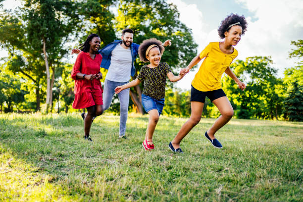 istock Family chasing each other 1325483728