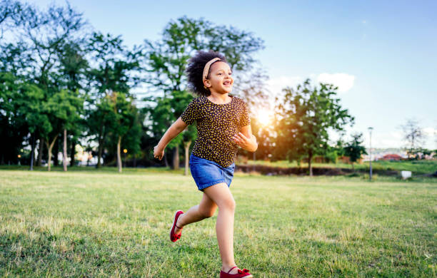 istock Little girl playing outdoor 1325484380