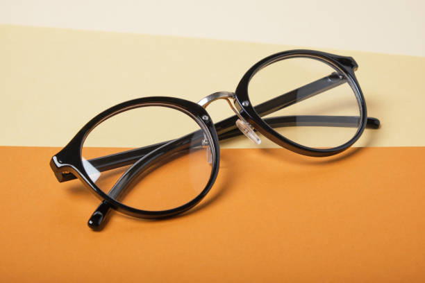 istock glasses on beige and brown background, geometric background 1325484594
