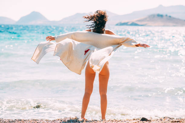 Happy Woman Posing in Bikini on the Beach