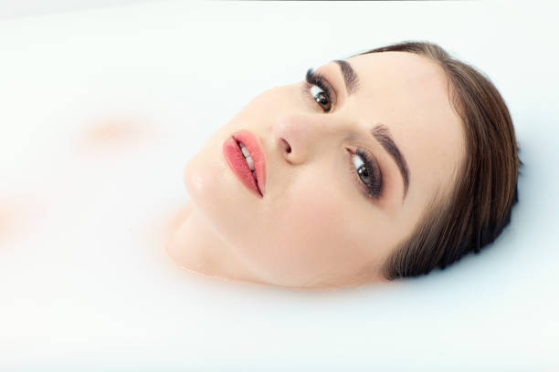 istock Woman Taking Bath In Milky Water 1325488768