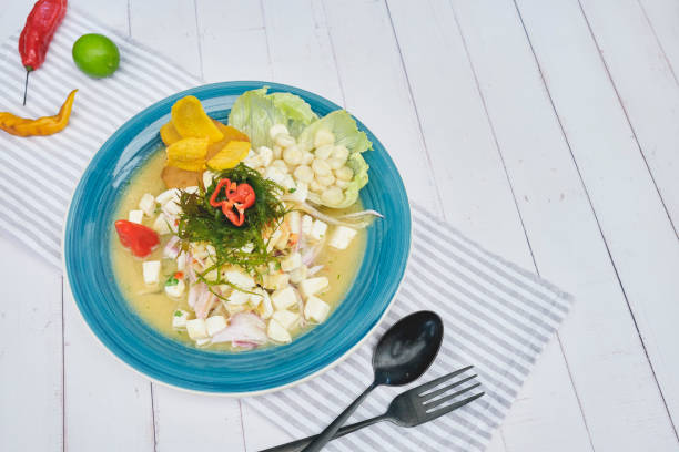 istock Peruvian food: fish ceviche de giant squid, served on a blue plate, Top view. 1325507140
