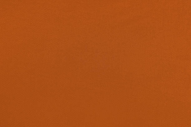 istock Orange homogeneous background with a textured surface 1325510684