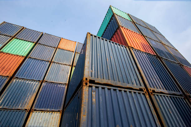 istock Container Cargo Port Ship Yard Storage Handling of Logistic Transportation Industry. Row of Stacking Containers of Freight Import/Export Distribution Warehouse. Shipping Logistics Transport Industrial, container box in warehouse in shipping port. 1325514508