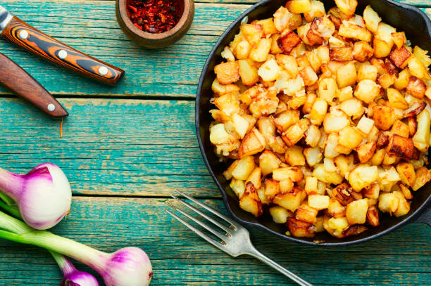 istock Roasted potatoes in iron skillet 1325527559
