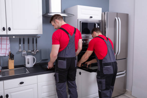 istock Technicians Repairing The Oven In Kitchen 1325529830