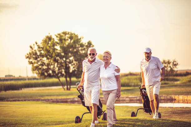 istock Three senior golfers. Focus is on man and woman. 1325531072