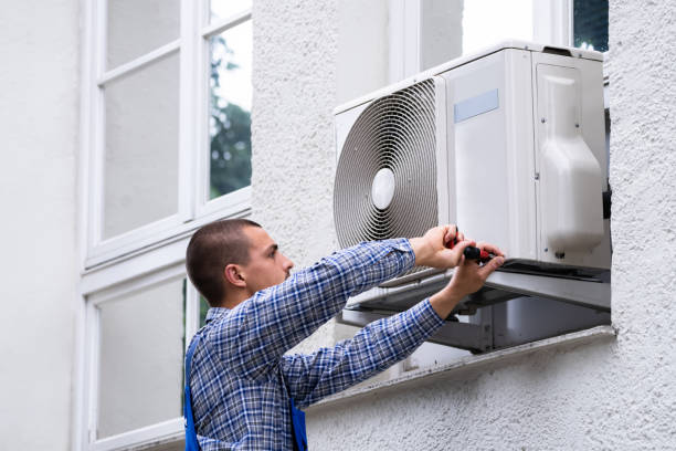 istock Technician Cleaning And Repairing Air Condition Appliance 1325531084