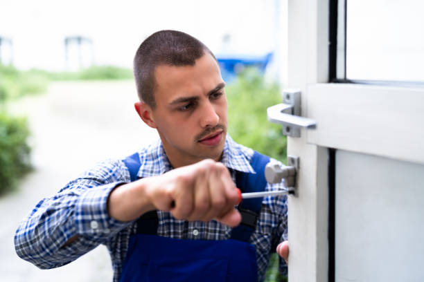 istock Locksmith Lock Door Repair. Worker Changing 1325531096