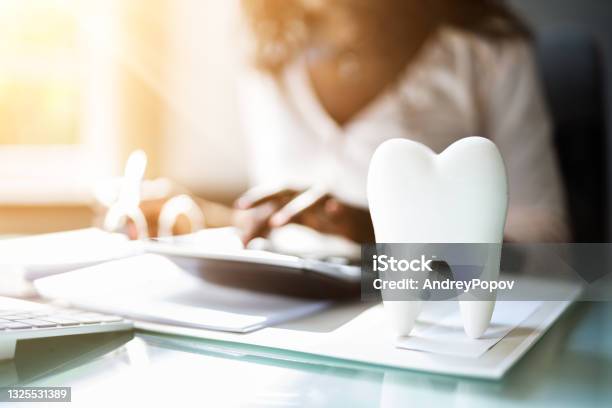 Dental Insurance Money Dentist Service Desk Stock Photo - Download Image Now - Dentist, Dental Equipment, Finance