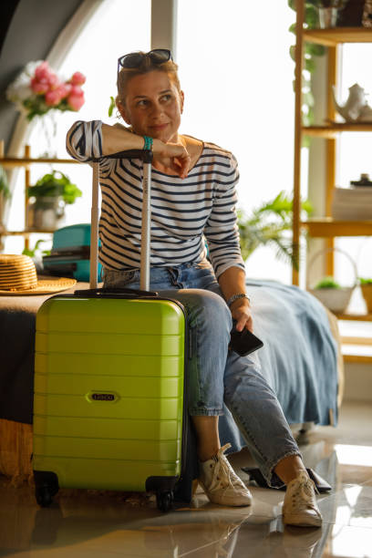 istock Contemplating a tropical vacation she is going on 1325531952