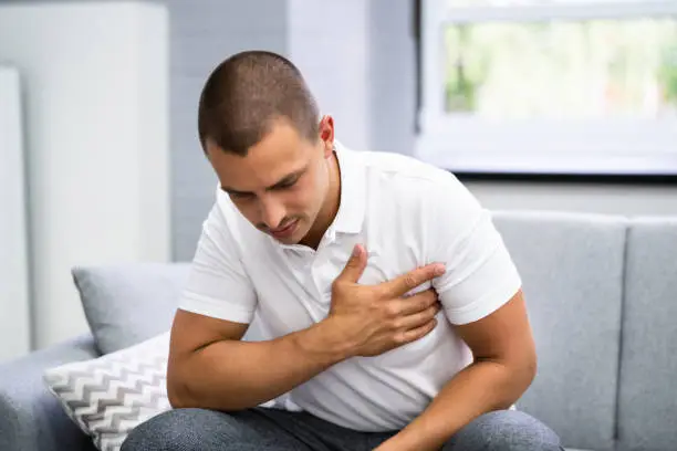Man Chest Pain. Angina Or Heart Attack