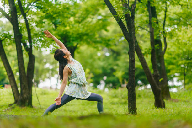 istock Woman practicing meditation and yoga in nature 1325538589